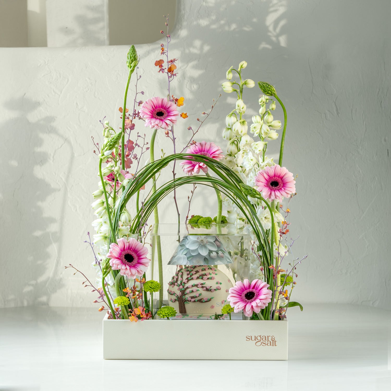Flower Arrangement With Mini Lamp Cake